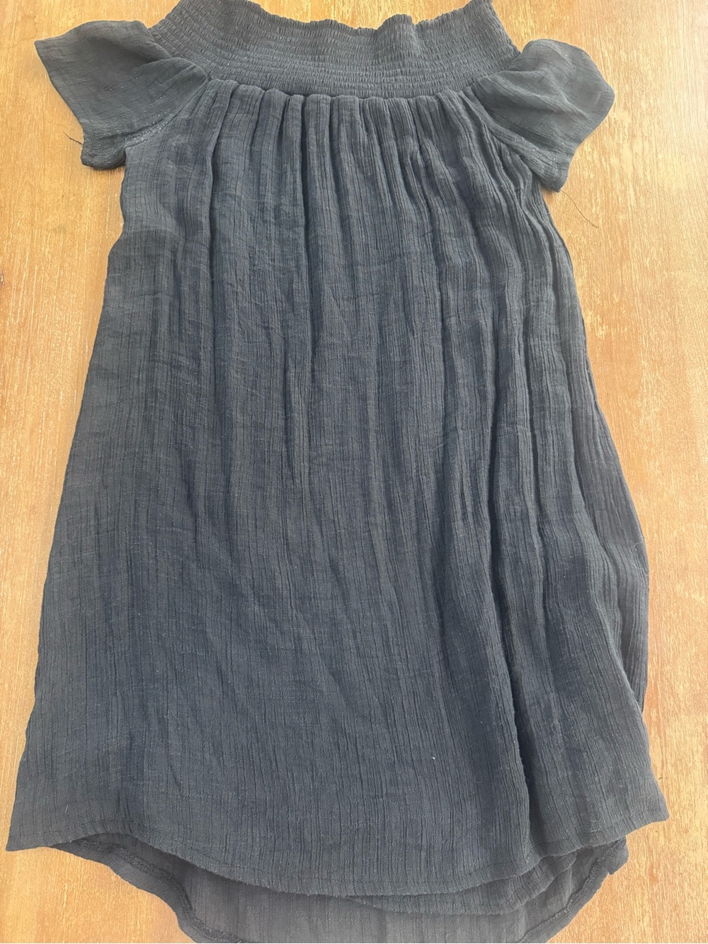 Smocked Off-Shoulder Mini Dress in Soft Black
